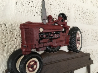 Farmhouse design coat rack with Farsnall agricultural tractor